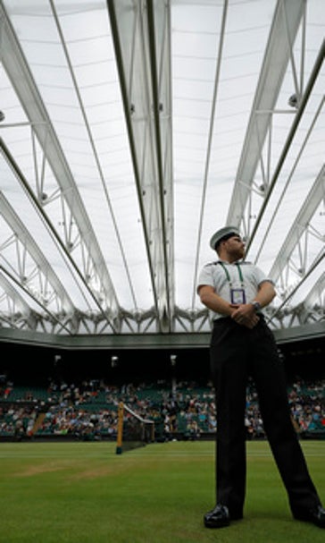 Querrey tops Murray at Wimbledon; Djokovic out; Federer wins